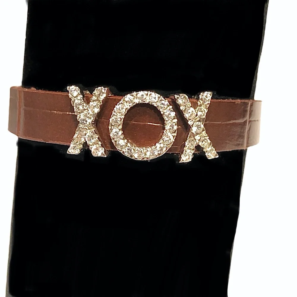 STERLING & CRYSTAL “XOX” SLIDERS ON BROWN BUCKLE BRACELET